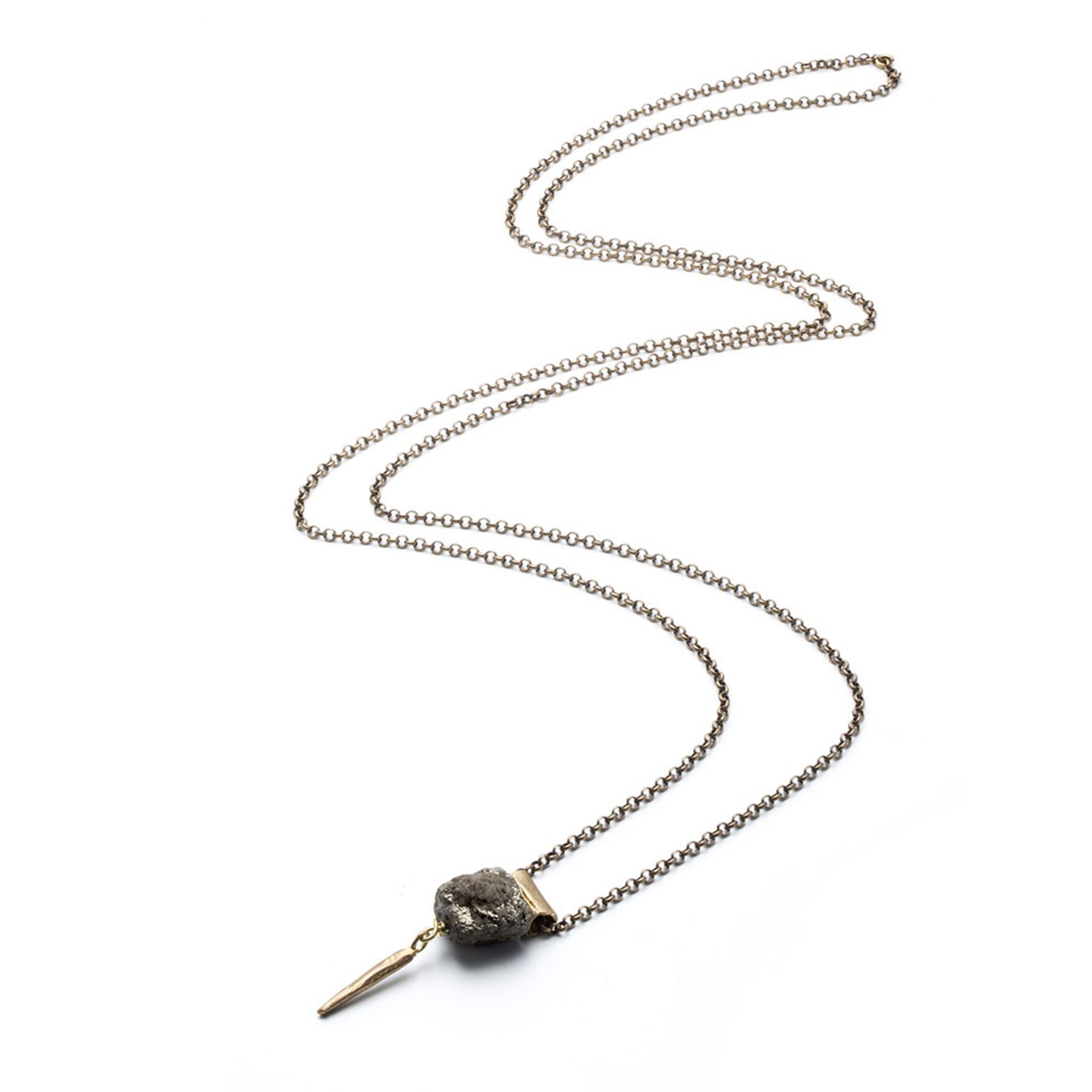 SMALL TUBE AND PYRITE