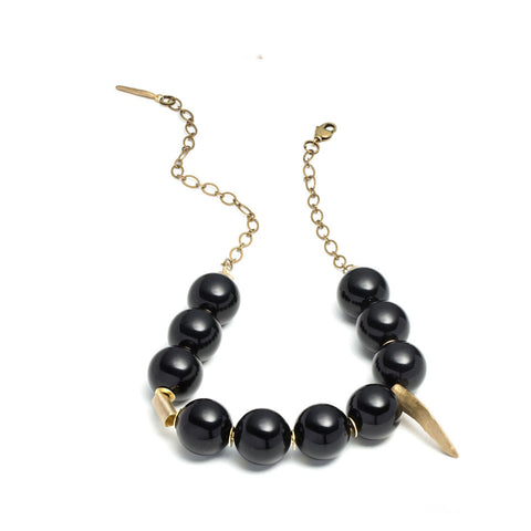 BLACK LUCITE AND TOOTH