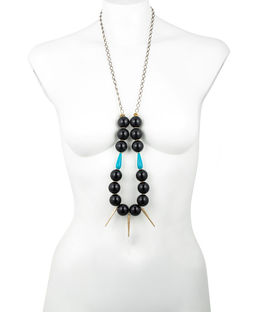 DAGGERS AND BLACK LUCITE