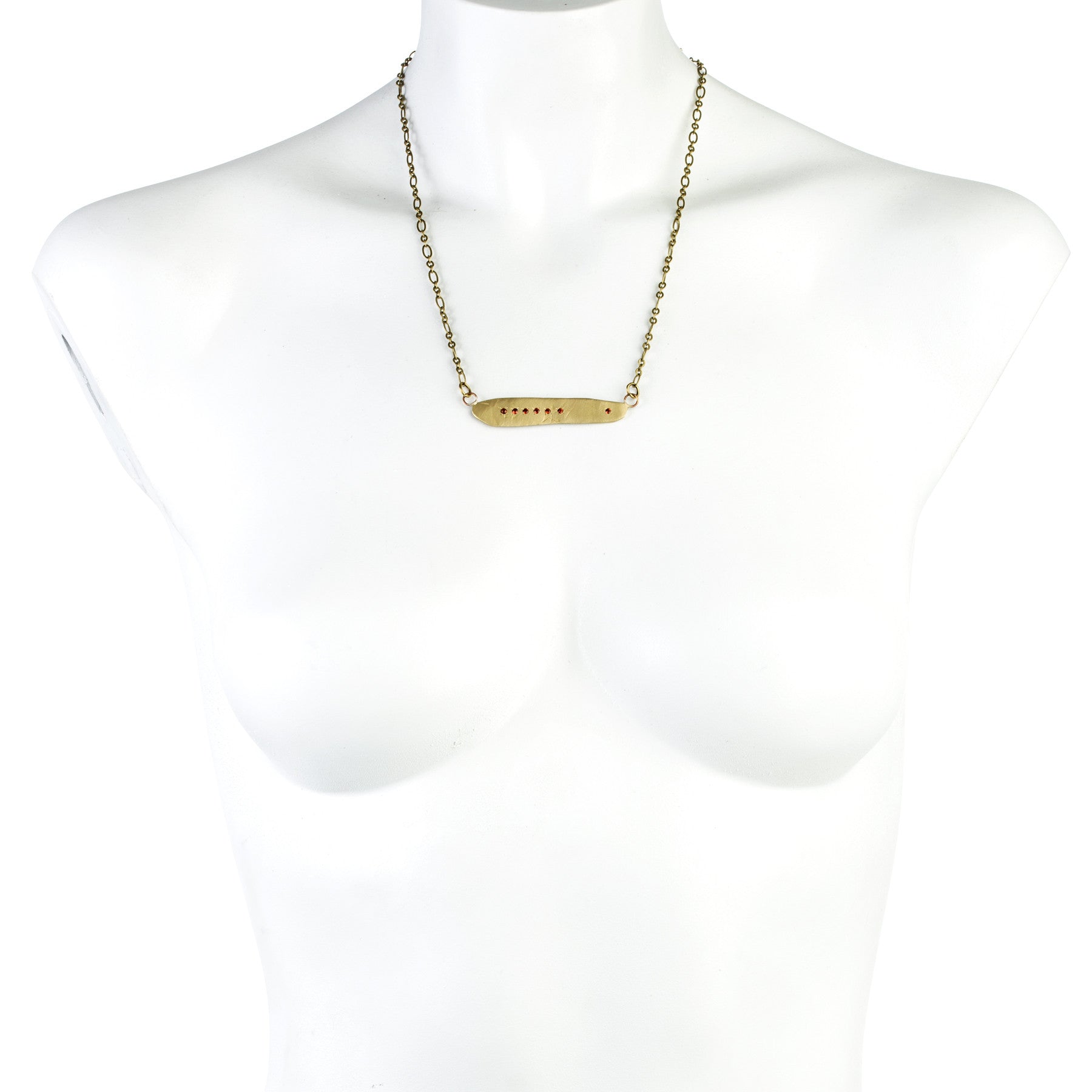 ELONGATED RECTANGLE AND 7 GARNETS
