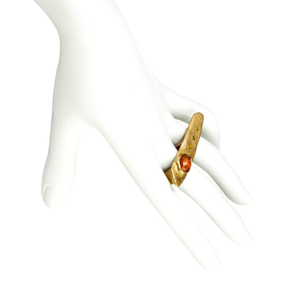 ELONGATED RECTANGLE AND GARNET RING